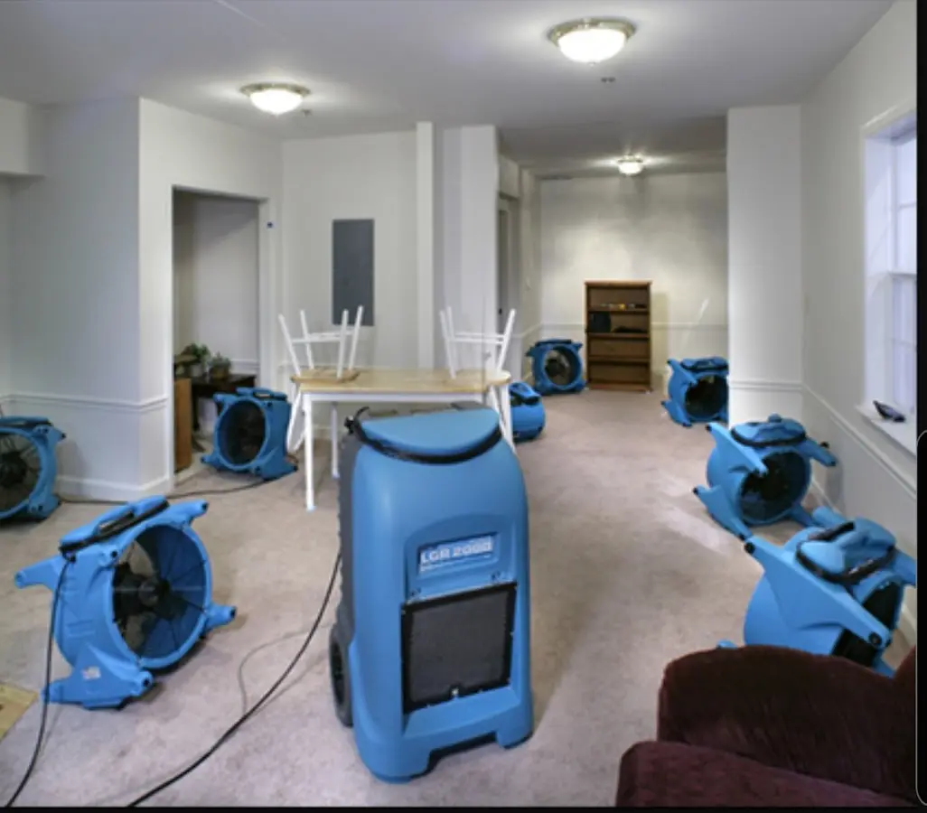Air movers and dehumidifier setup for Water Damage Restoration in Clovis